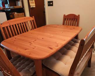 Beautiful solid pine table with 2 benches and 2 chairs. Pads for benches included