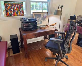 Beautiful Arts and Crafts era and style library table (43" x 27" deep x 29.5") 2025 Good Vibes Sony turntable and Paradigm speakers, Yamaha 5 disc CD player, Kenwood receiver. Artwork on left by Haitian artist Laurent Casimir with receipt 1972, artwork on right is Jacob Landau "Man's End" with paperwork. Herman Miller Embody desk chair. Arm cushions have damage! Can easily be replaced, rest of chair structure is excellent :) Great for petite sizes!