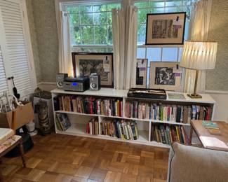So many books! Crosley Eclipse turntable stereo system, works great, currently playing :)