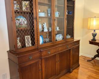Beautiful large breakfront glass front cabinet! 6'7.5" x 19" deep. Beveled glass, beautiful inlay, has locking key. Lots of storage