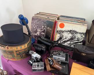 Hippy dippy fun vintage vinyl collection! Feminist records and others. Old top hat, vintage photography