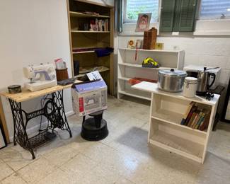 Beginner's Singer sewing machine, nice table too! More bookcases