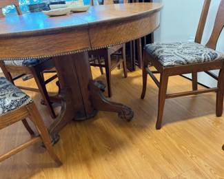 Beautiful, well cared for antique 45" solid oak claw foot table and chairs set, 5 chairs