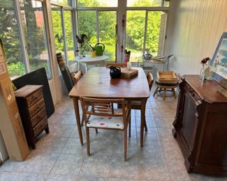 Cute sunroom! Mid-century modern table and chairs set that needs refinishing. Table has 1 leaf