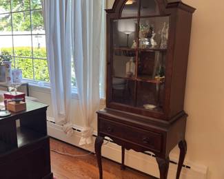 The sweetest single arch French curio cabinet with Queen Anne legs. Cabinet is 2' wide x 16.5" deep x 64.5" tall