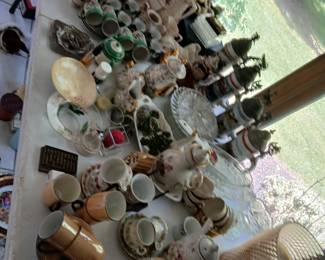 tables of small glass, china, cups, saucers, bowls, etc.