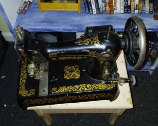 antique black singer sewing machine table top