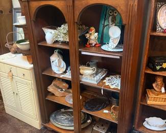 bookshelf with collectibles