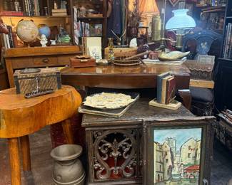 framed art, wood side table, globes, lamps