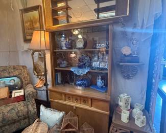 decorative birdhouse, baskets, MCM shelf, lamps