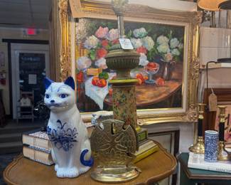 vintage cat figurine, framed oil painting, lamps, candlesticks
