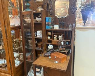 Victorian-style oak side-by-side secretary desk and display cabinet with mirrored top