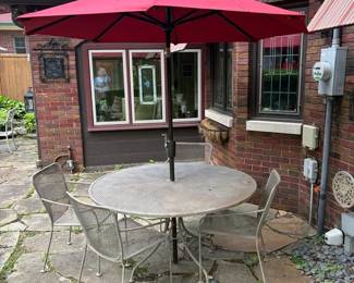  006 Round Wrought Iron Table With Red Umbrella