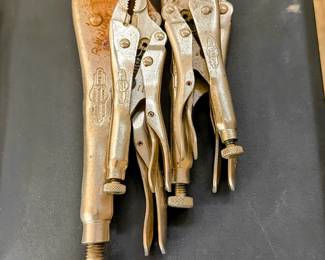Set of locking pliers, Vise-Grips, in assorted sizes. Other sets of pliers, wrenches, and hand tools are also available. 