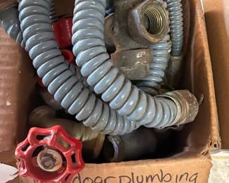 Box of assorted plumbing parts, hoses, valves, fittings and connector pieces. Useful garage/workshop lot for repairs, DIIY projects or plumbing supplies. Also available, boxes filled with indoor pluming supplies, lawn irrigation and water supplies, huge box of various electrical supplies. 