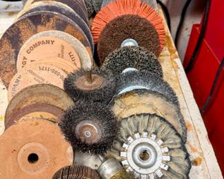 Assorted bench grinder wheels, wire brushes, buffing/polishing wheels, and grinding accessories. Great workshop lot to pair with available bench grinders for sharpening, cleaning, polishing, and metalwork. 