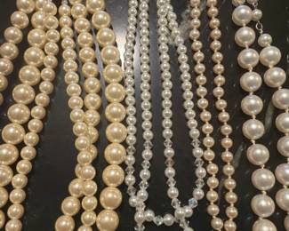 Vintage look faux pearl necklaces in assorted lengths and styles. These will add a touch of class to an elegant gown or jeans and a t-shirt.