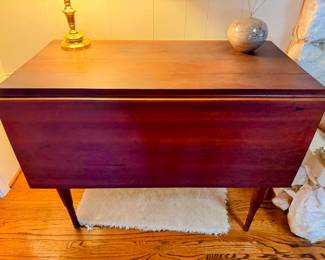 Beautiful drop leaf table, solid cherry circa 1950s pristine condition