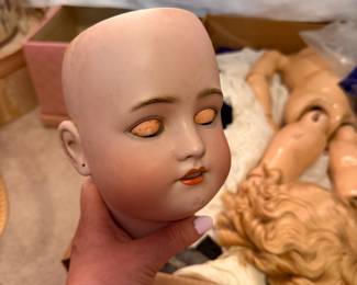 Extremely creepy antique doll and doll parts 