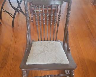 Antique Carved Spindle Back Rocking Chair