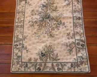 Small rug, also a smaller matching one. 