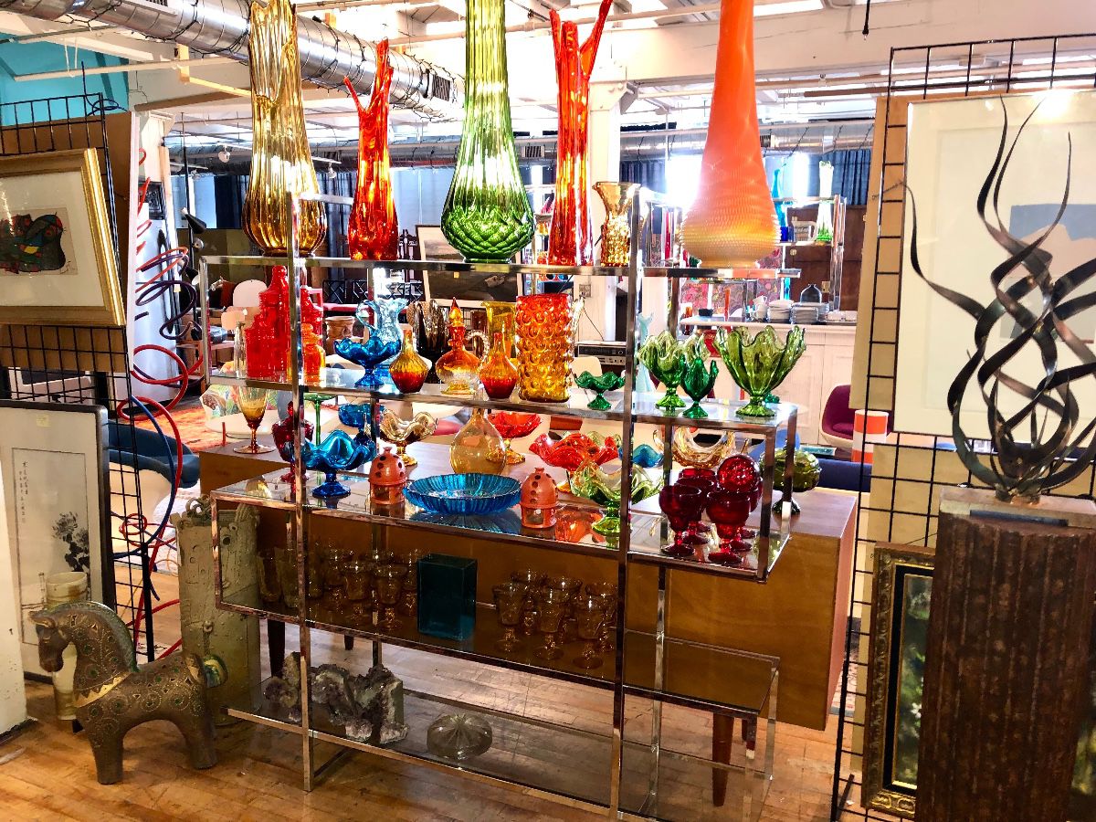 A huge selection of Mid Century Modern Swung  glass by LE Smith & Viking