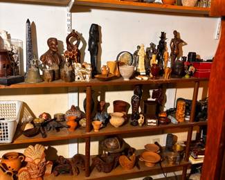Carvings and pottery from travels