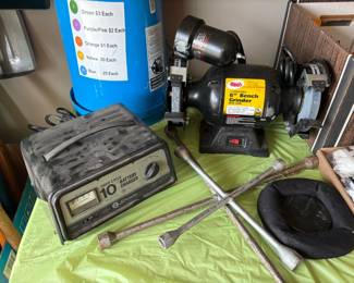 battery charger, 6 inch bench grinder, lug wrenches