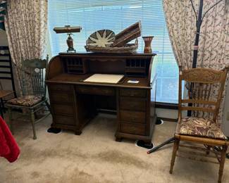 Roll top desk, chairs, lamps, baskets