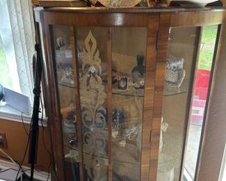 Beautiful curio cabinet filled with treasures!