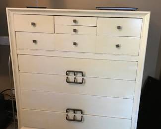 Cream 10‑Drawer Dresser on Casters – 49" H × 40" W × 20" D Charming cream‑finished 10‑drawer dresser featuring a mix of small top drawers and larger lower drawers for excellent storage. The piece includes modern metallic hardware with geometric detailing and sits on small casters for easy movement. A great blend of vintage character and updated style.  Size: 49" high × 40" wide × 20" deep