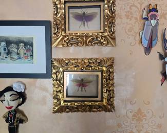 Peruvian locus with handcarved frame.