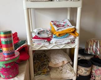 LOADS of tablecloths- half of them vintage