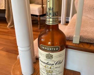 Empty bottle, large Canadian Club