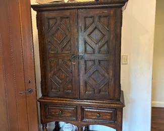 Tall wooden armoir