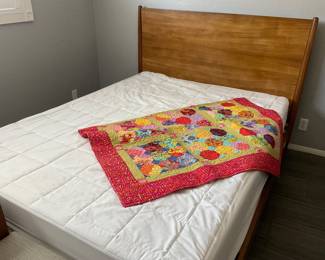 Bed includes headboard, frame, mattress
