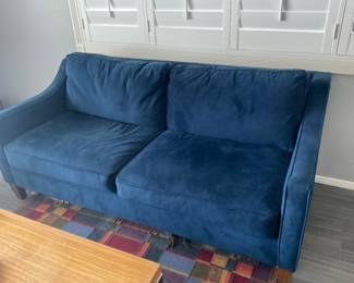 Blue velvet sofa
