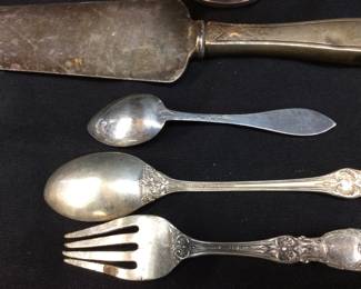 STERLING SILVER REED AND BARTON SPOON & FORK, FISHER WEIGHTED STERLING CANDLE STANDS, CANADIAN STERLING SILVER SOUVENIR SPOON, STERLING HANDLE CAKE KNIFE, SPOONS AND FORK WEIGH 56 GRAMS