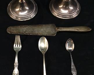 STERLING SILVER REED AND BARTON SPOON & FORK, FISHER WEIGHTED STERLING CANDLE STANDS, CANADIAN STERLING SILVER SOUVENIR SPOON, STERLING HANDLE CAKE KNIFE, SPOONS AND FORK WEIGH 56 GRAMS