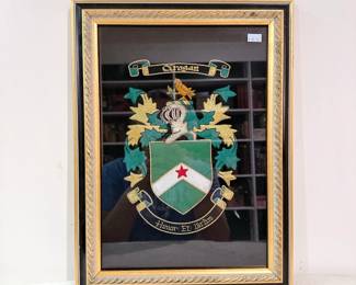embroidered Grogan family crest
