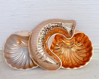 copper colored aluminum shell mold and fish mold