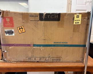 New in box range hood 