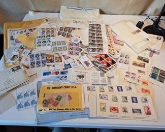 Huge Assortment of Loose mostly unused U.S. and International Postage Stamps