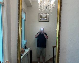 Ornate floor mirror with gold frame (photographer not included)