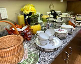 Assortment of vintage china, platters, and pitchers