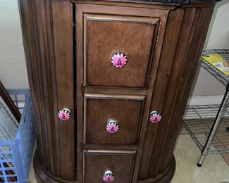 Butler Specialty drum table, oak finish with green marble top
