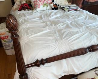 Vintage four poster bed with pineapple finials