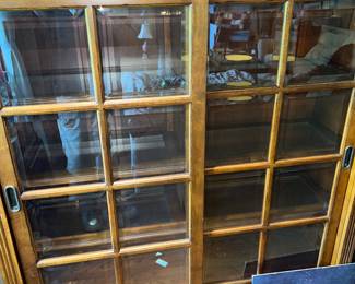 Bookcase with sliding glass doors