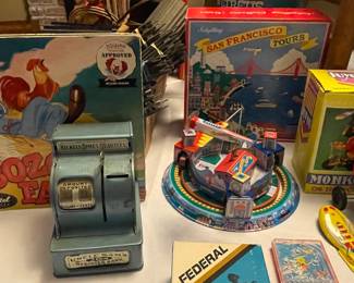 Schilling San Francisco tours windup toy, Uncle Sam’s 3 coin register bank