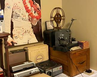 16mm Kodak projector, 16mm sound films, 45s, Anscomatic slide projector, bar supplies vintage, basin w/stand, beaded purses antique, Bell and Howell Filmo sportster camera, Movie mite corporation sound projector
